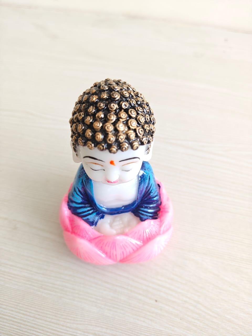 Little Buddha Idol on a Lotus Base.